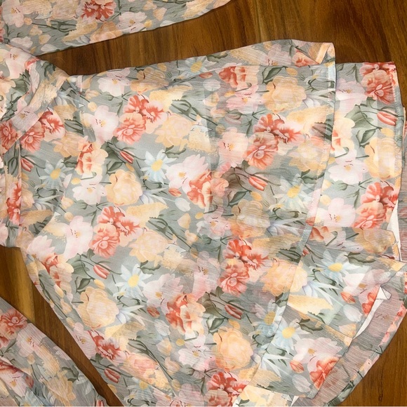 NWOT Floral Long Sleeve Romper with tie in the back and smocked sleeves - Picture 3 of 8